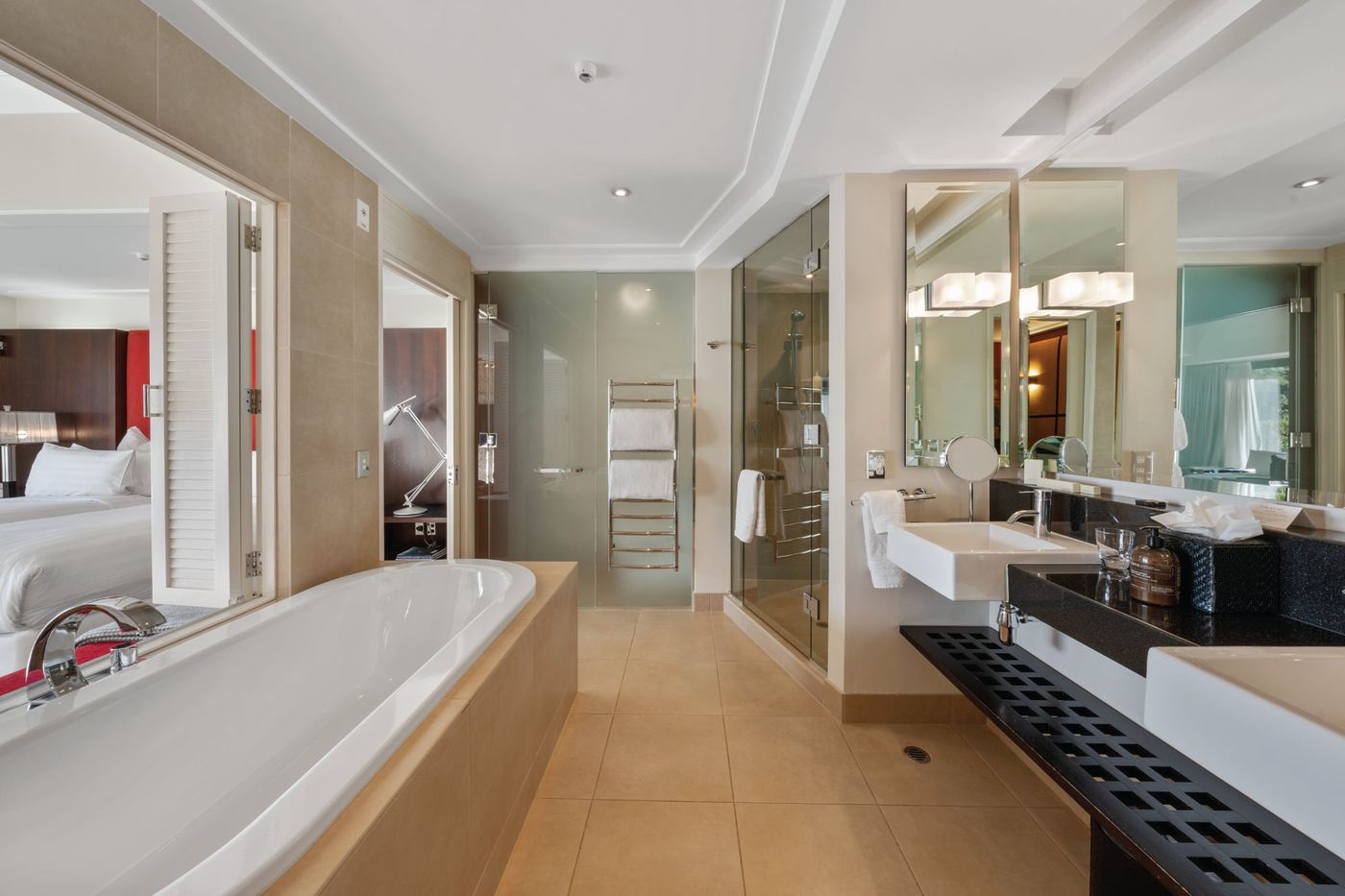 Marble ensuite bathroom with rainfall shower